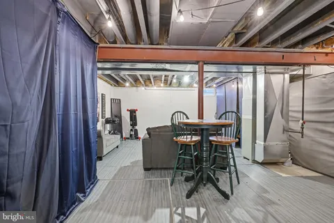 a view of a backyard with sitting area