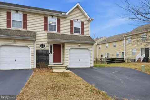 front view of a house with a patio