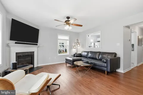 a kitchen with a sink window and cabinets