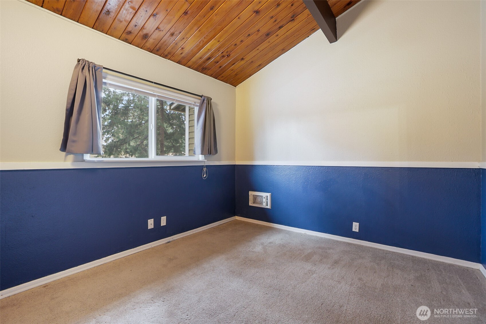 41 Barbara Lane Belfair, WA 98528 - Photo 22 of 28 a view of an empty room with a window