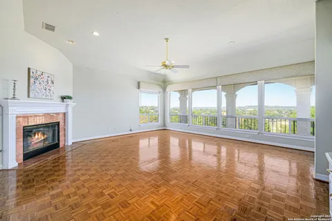 a kitchen with stainless steel appliances granite countertop a stove sink and cabinets