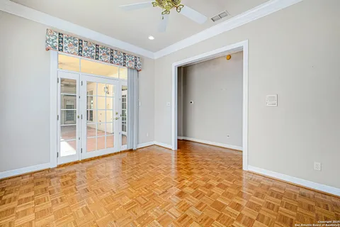 a bathroom with a sink a toilet and a window