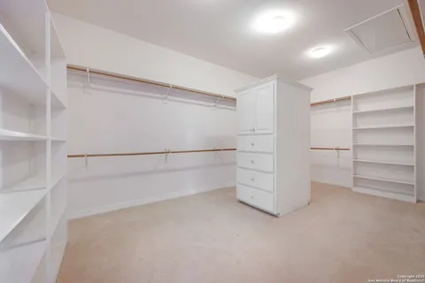 a view of a balcony with wooden floor