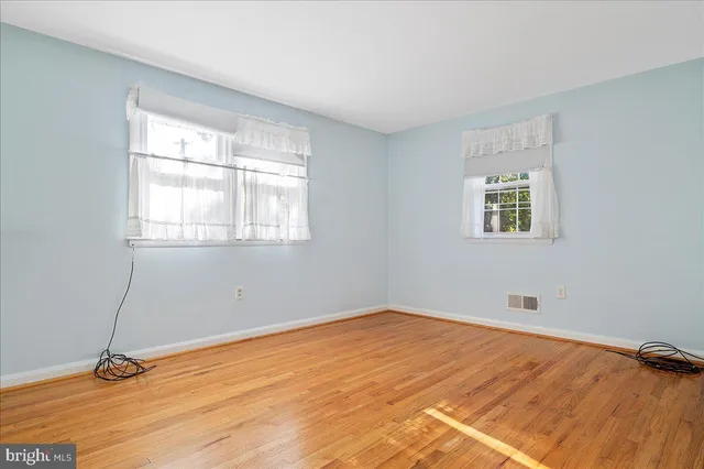 a bathroom with a shower a toilet and a sink