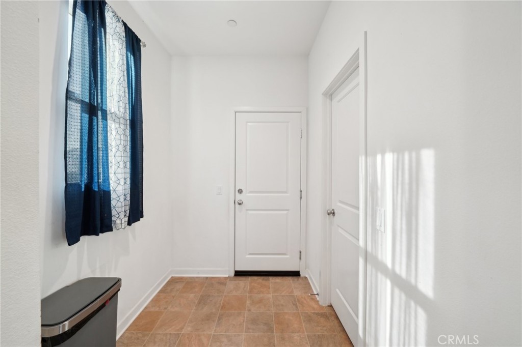 36927 Arezzo Court Beaumont, CA 92223 - Photo 16 of 53 a view of a bathroom with a sink and a mirror