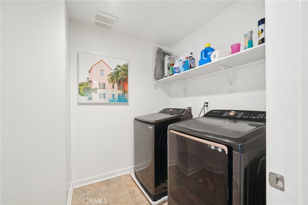 36927 Arezzo Court Beaumont, CA 92223 - Photo 27 of 53 a utility room with dryer and washer