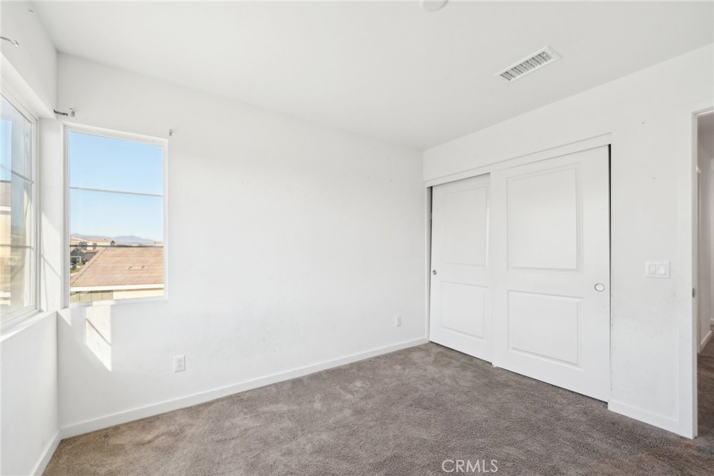 36927 Arezzo Court Beaumont, CA 92223 - Photo 32 of 53 a view of an empty room