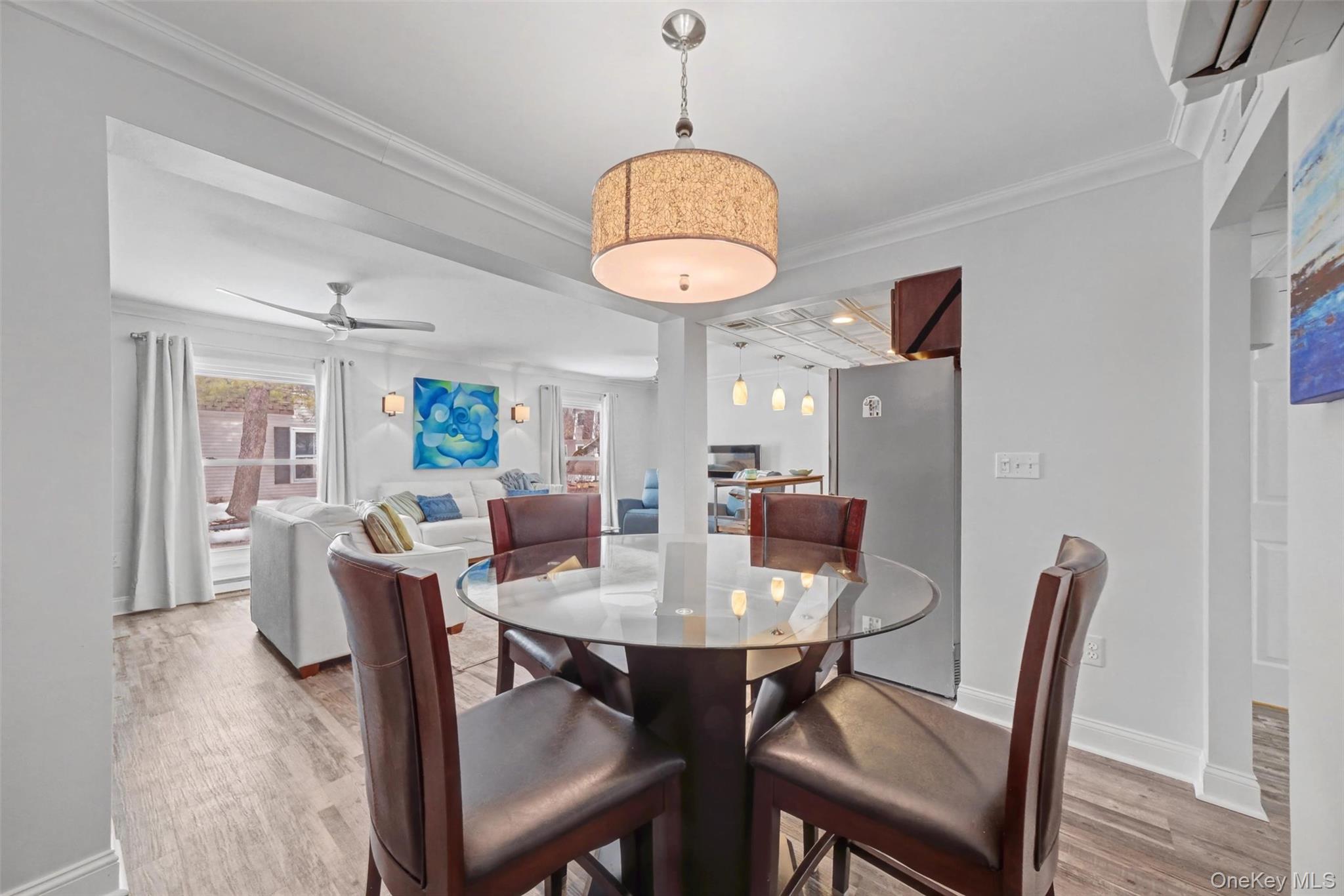 32 Hurlihe Street, Unit A Poughkeepsie, NY 12601 - Photo 11 of 21 a view of a dining room with furniture window and wooden floor