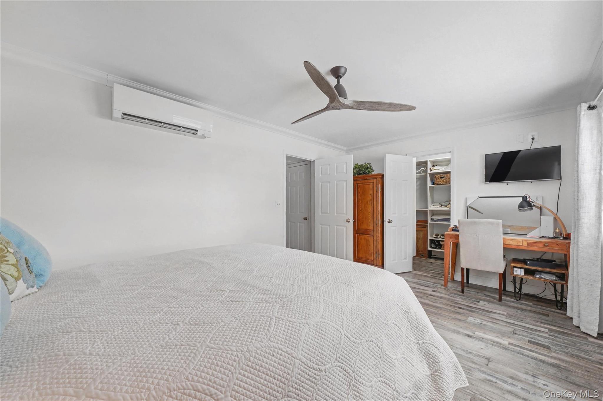 32 Hurlihe Street, Unit A Poughkeepsie, NY 12601 - Photo 16 of 21 a bedroom with a bed and a flat screen tv