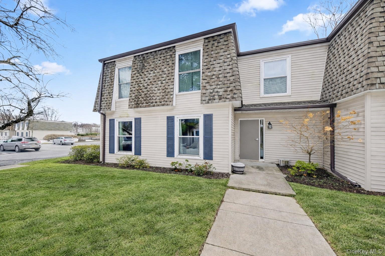 32 Hurlihe Street, Unit A Poughkeepsie, NY 12601 - Photo 2 of 21 a front view of a house with garden