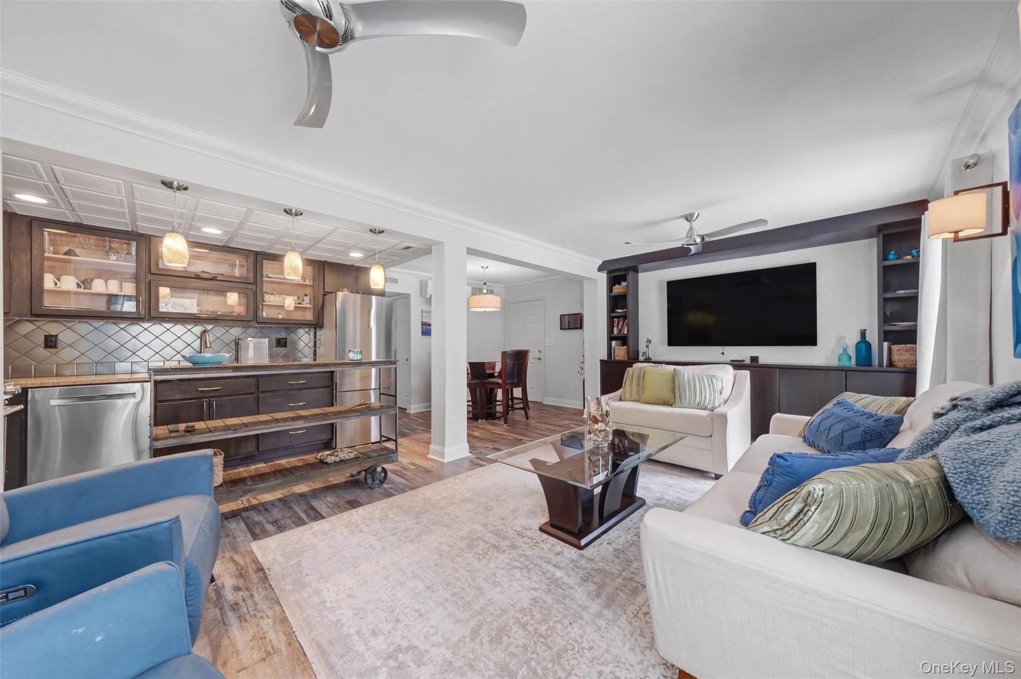 32 Hurlihe Street, Unit A Poughkeepsie, NY 12601 - Photo 6 of 21 a living room with furniture and a flat screen tv