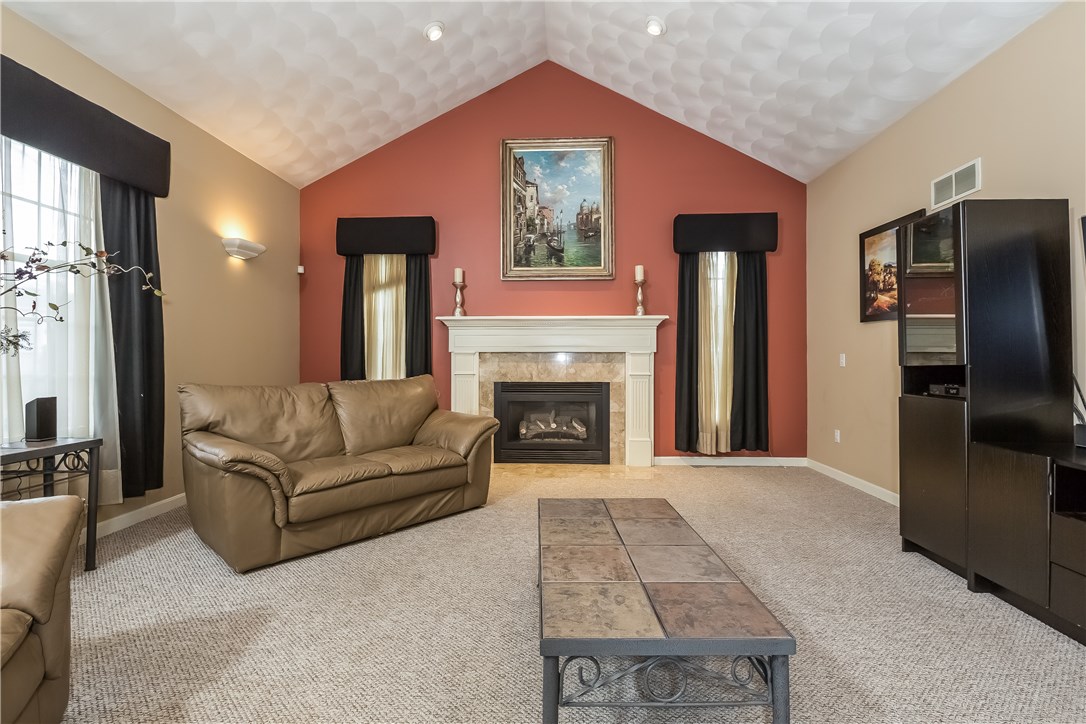 40 Basil Crossing Cranston, RI 02921 - Photo 8 of 37 Great room w/ vaulted ceilings and gas fireplace