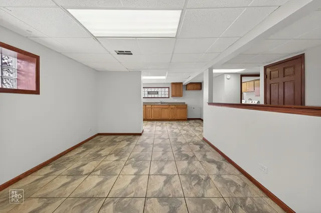 a view of a hallway with a window