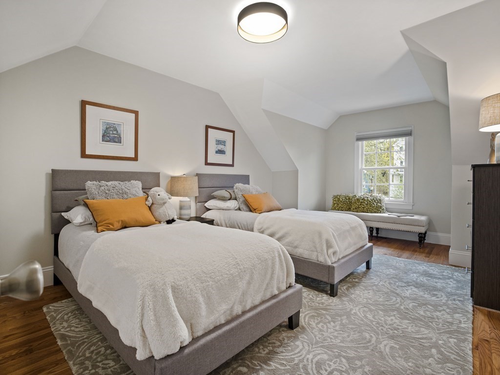 44 A Orchardhill Road, Unit A Boston, MA 02130 - Photo 16 of 37 a bedroom with two beds and a window