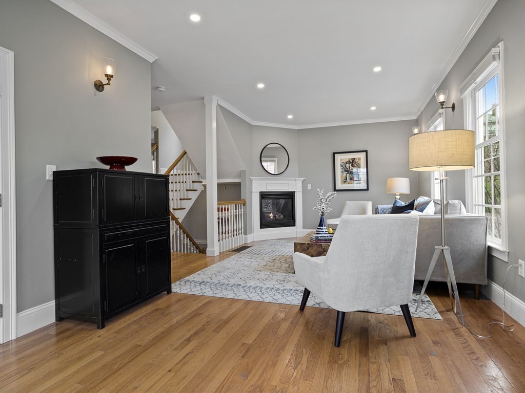 44 A Orchardhill Road, Unit A Boston, MA 02130 - Photo 2 of 37 a living room with furniture and a wooden floor