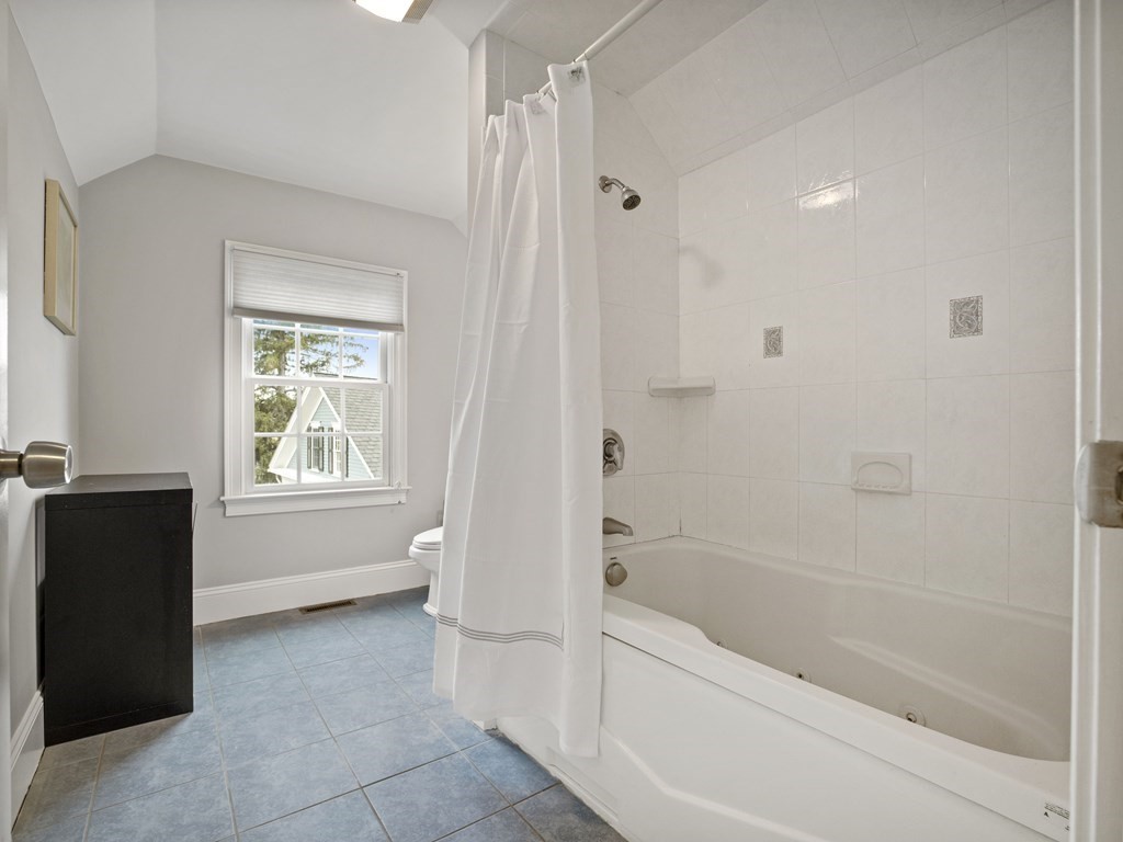44 A Orchardhill Road, Unit A Boston, MA 02130 - Photo 21 of 37 a bathroom with a bathtub and a shower