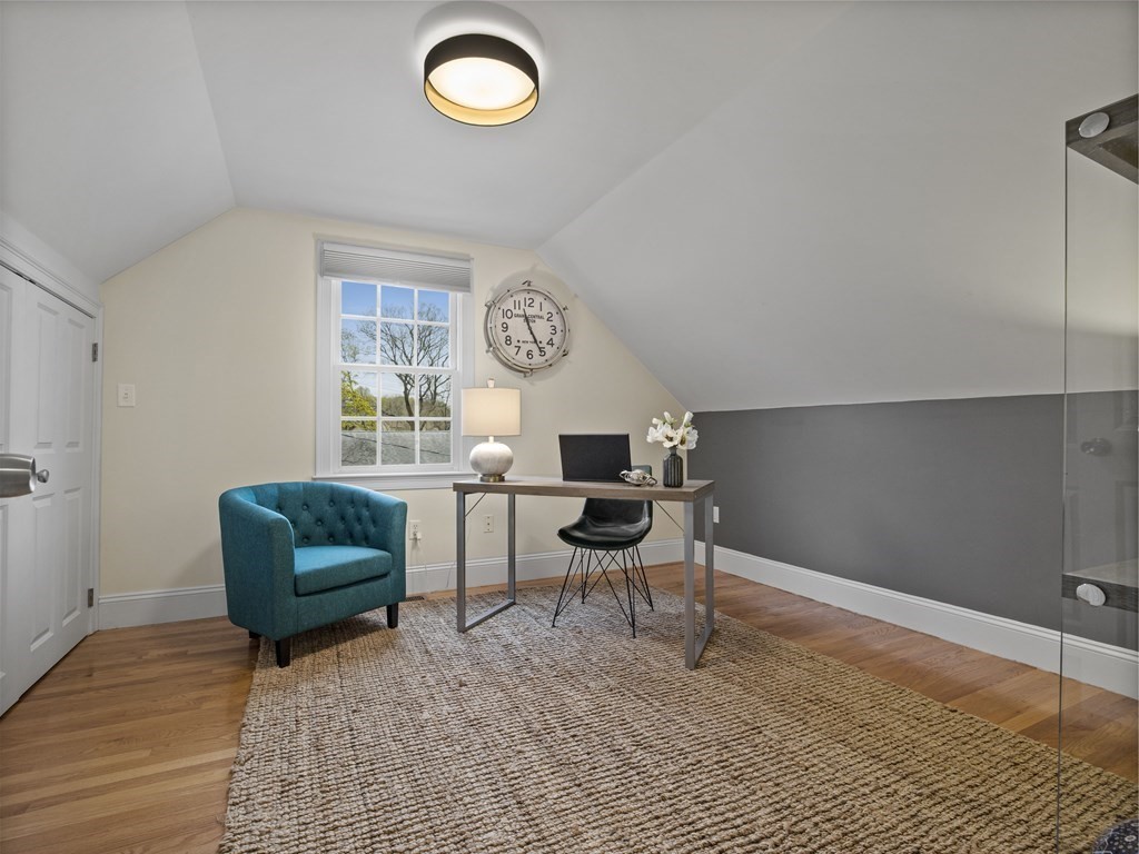 44 A Orchardhill Road, Unit A Boston, MA 02130 - Photo 24 of 37 a living room with furniture and a chair