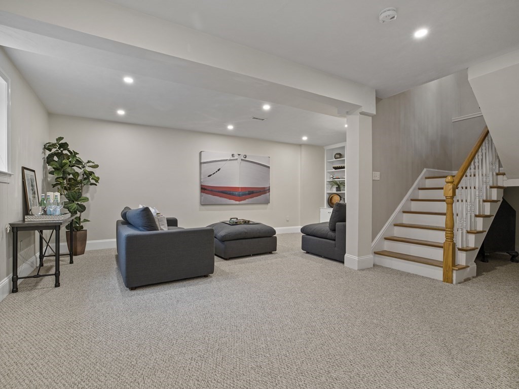 44 A Orchardhill Road, Unit A Boston, MA 02130 - Photo 25 of 37 a living room with furniture and a flat screen tv