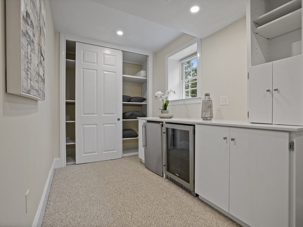 44 A Orchardhill Road, Unit A Boston, MA 02130 - Photo 27 of 37 a kitchen with cabinets and stainless steel appliances