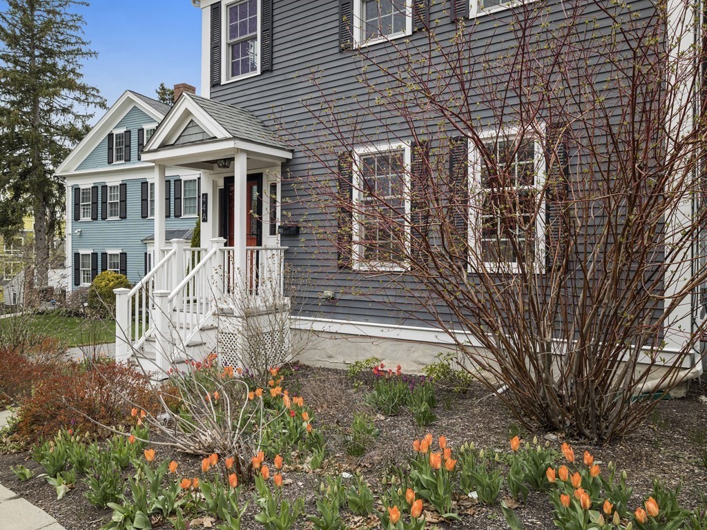 44 A Orchardhill Road, Unit A Boston, MA 02130 - Photo 30 of 37 a front view of a house with garden