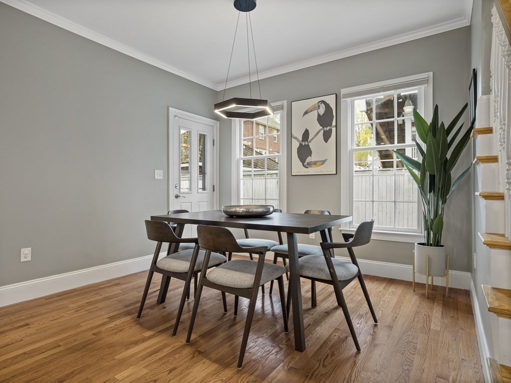 44 A Orchardhill Road, Unit A Boston, MA 02130 - Photo 4 of 37 a view of a dining room with furniture window and wooden floor