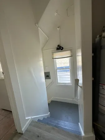 a view of an empty room and window