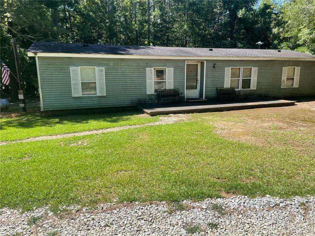 2655 Camp Branch Road Buford, GA 30519 - Photo 2 of 22 a view of a house with a backyard