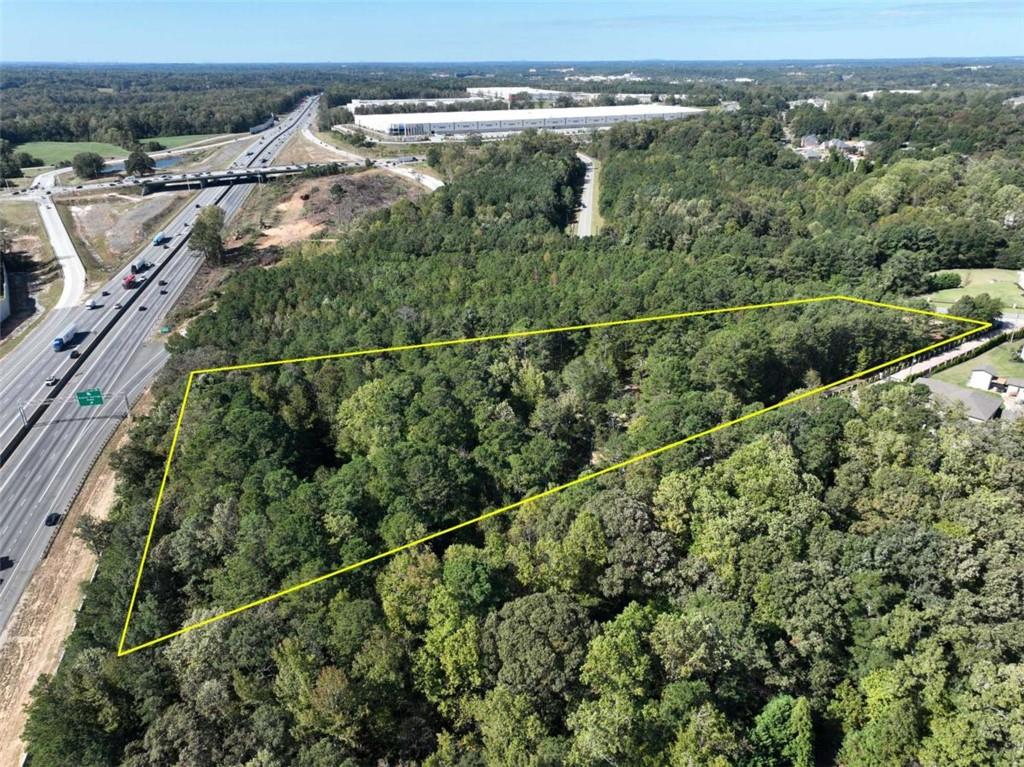 2655 Camp Branch Road Buford, GA 30519 - Photo 22 of 22 an aerial view of a residential houses with outdoor space and trees