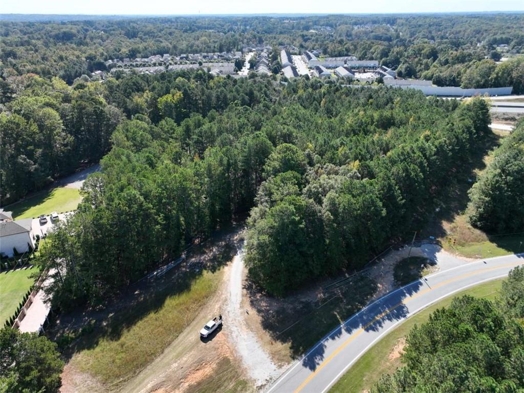 2655 Camp Branch Road Buford, GA 30519 - Photo 10 of 22 an aerial view of residential house with outdoor space