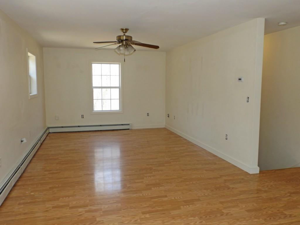 569 Back Winterport Road Winterport, ME 04496 - Photo 2 of 19 Unit 1 Living room area. This unit...