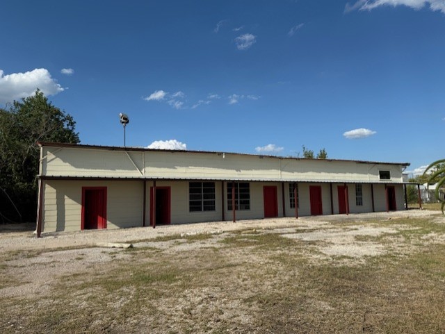 Tbd Gainesville Street Houston, TX 77015 - Photo 7 of 16 a front view of a building with a garage
