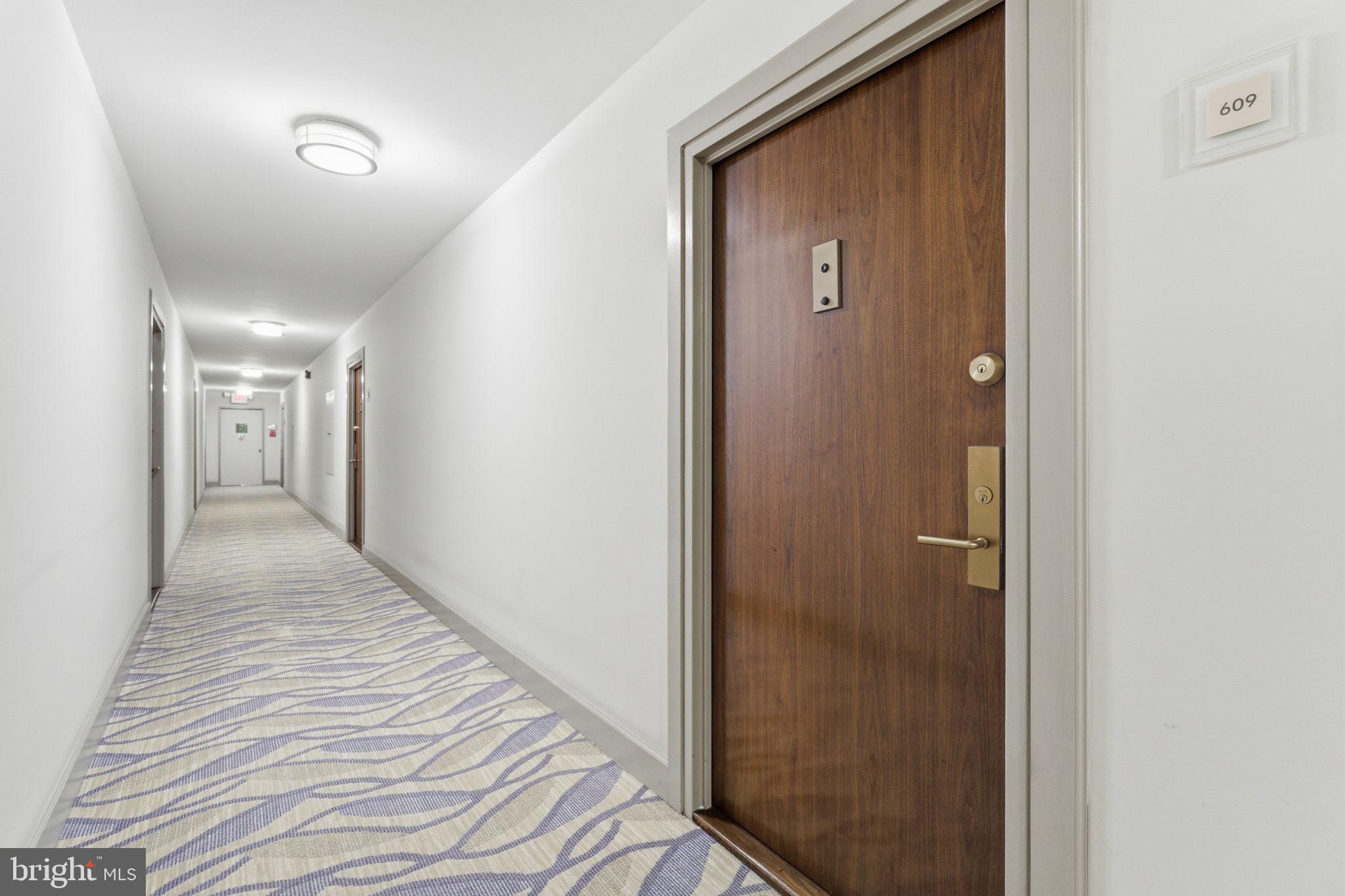 1435 4th Street Southwest, Unit B609 Washington, DC 20024 - Photo 34 of 52 a view of a hallway with wooden floor