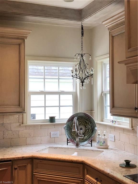 148 Maplevalley Road Advance, NC 27006 - Photo 13 of 30 Charming kitchen chandelier above the sink