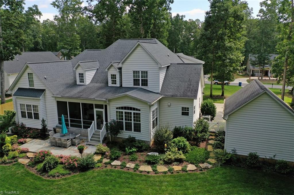 148 Maplevalley Road Advance, NC 27006 - Photo 29 of 30 Beautifully landscaped backyard with patio