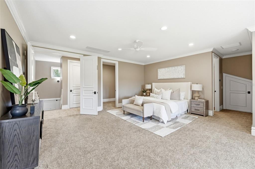 855 Southeast 87th Street Ocala, FL 34480 - Photo 32 of 79 a bed room with furniture and a potted plant