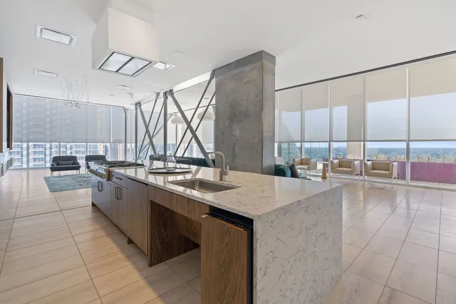 a view of a living room and bathroom