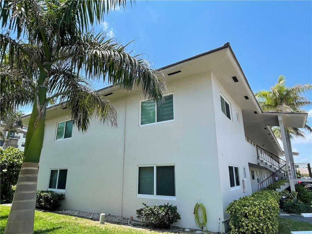 2601 South Ocean Boulevard, Unit 9 Boca Raton, FL 33432 - Photo 2 of 33 a front view of a house with balcony
