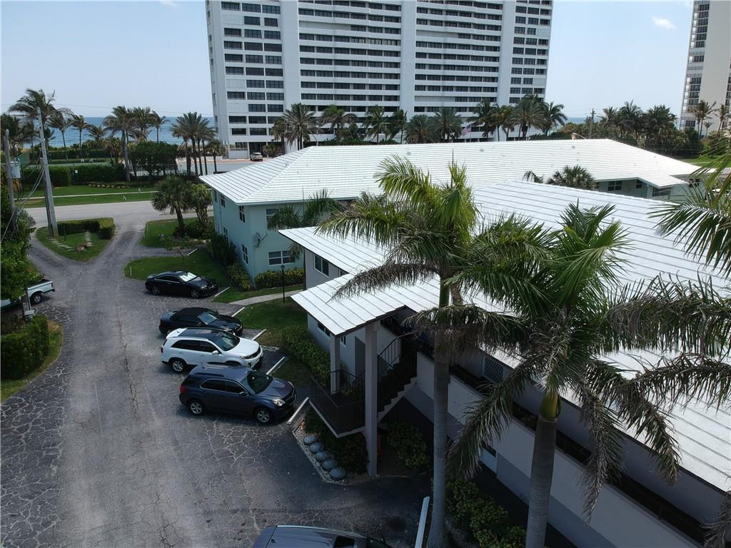 2601 South Ocean Boulevard, Unit 9 Boca Raton, FL 33432 - Photo 21 of 33 a view of a backyard with sitting area