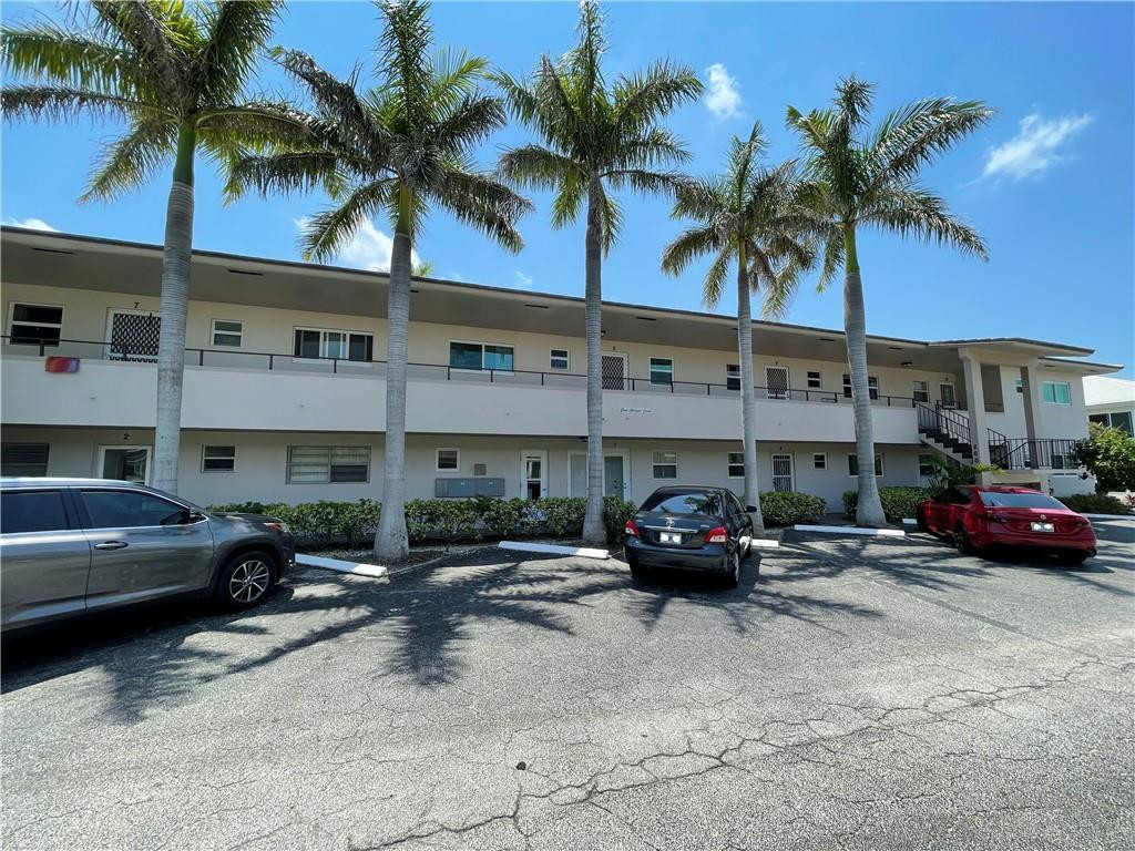2601 South Ocean Boulevard, Unit 9 Boca Raton, FL 33432 - Photo 27 of 33 a car parked in front of a building