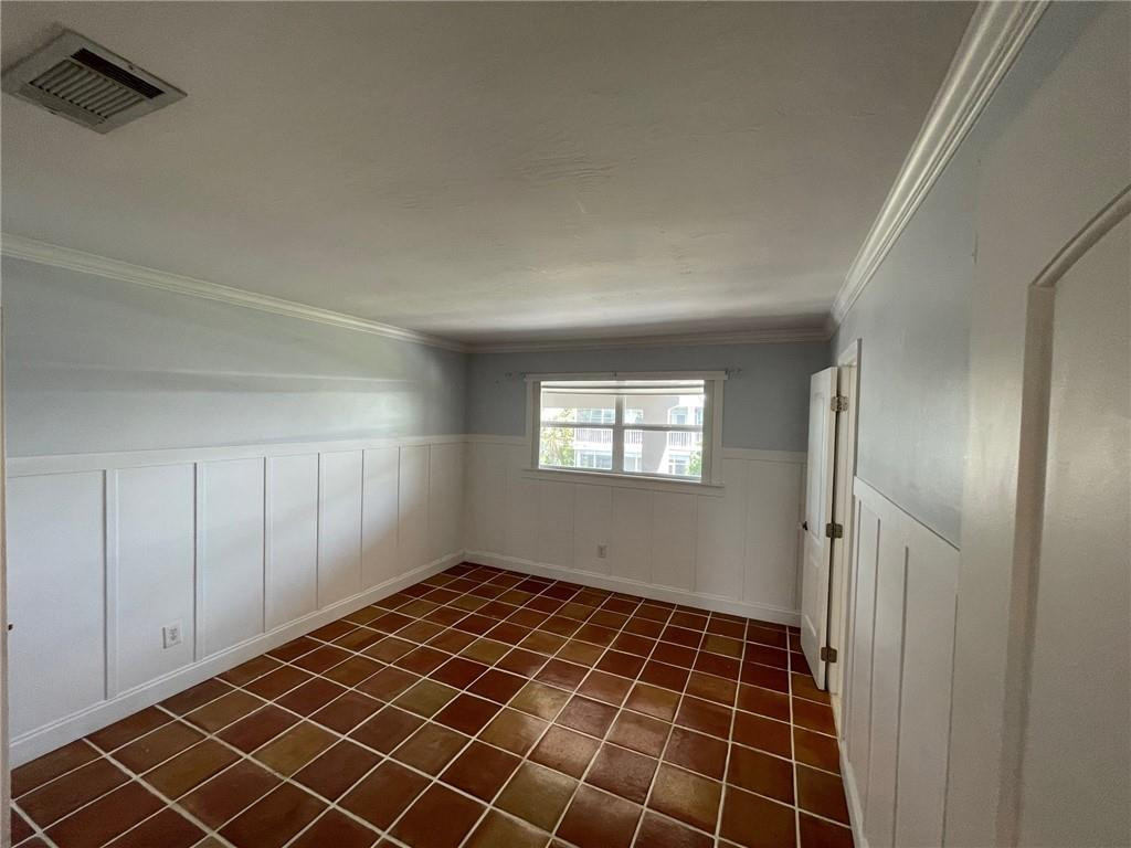 2601 South Ocean Boulevard, Unit 9 Boca Raton, FL 33432 - Photo 9 of 33 a view of an empty room and window