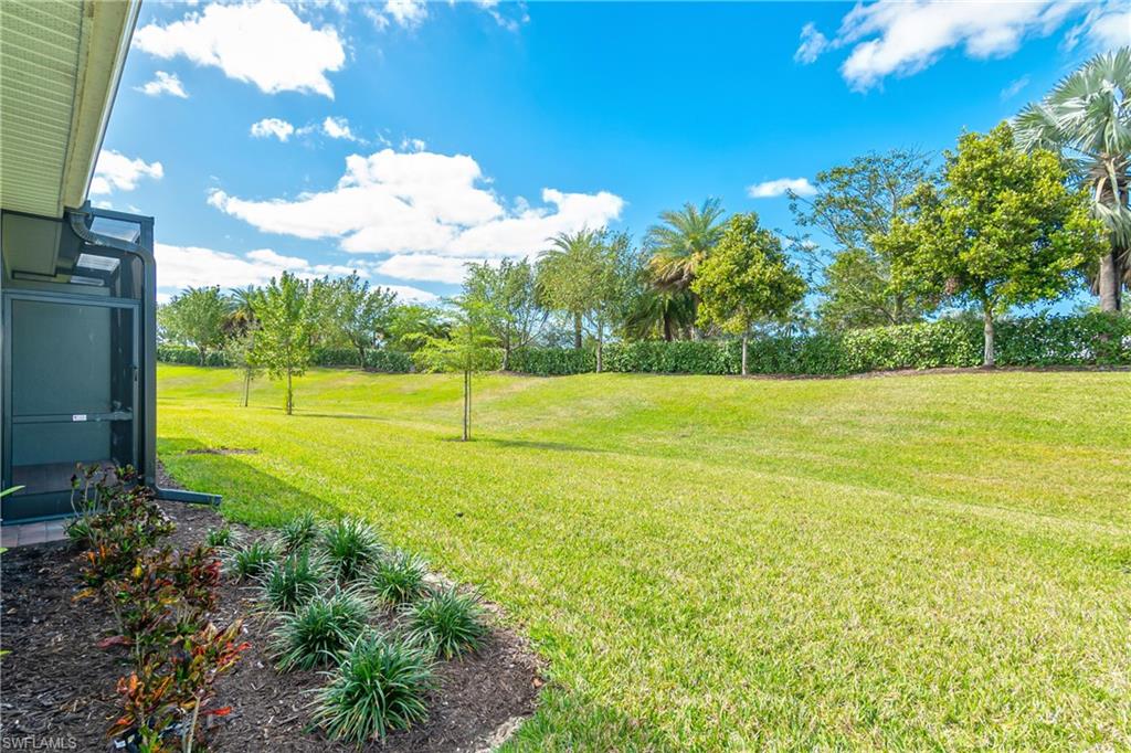 14559 Edgewater Circle Naples, FL 34114 - Photo 22 of 49 a view of an ocean and beach