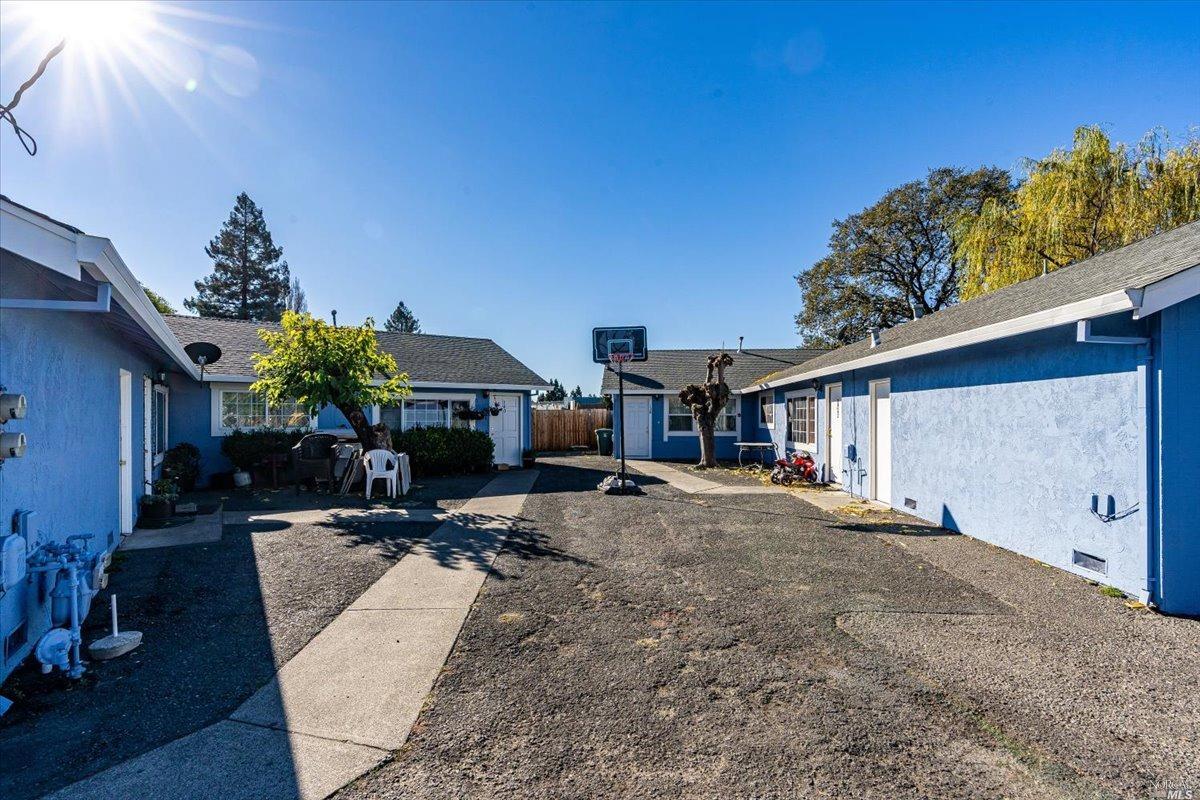 a living room with patio furniture