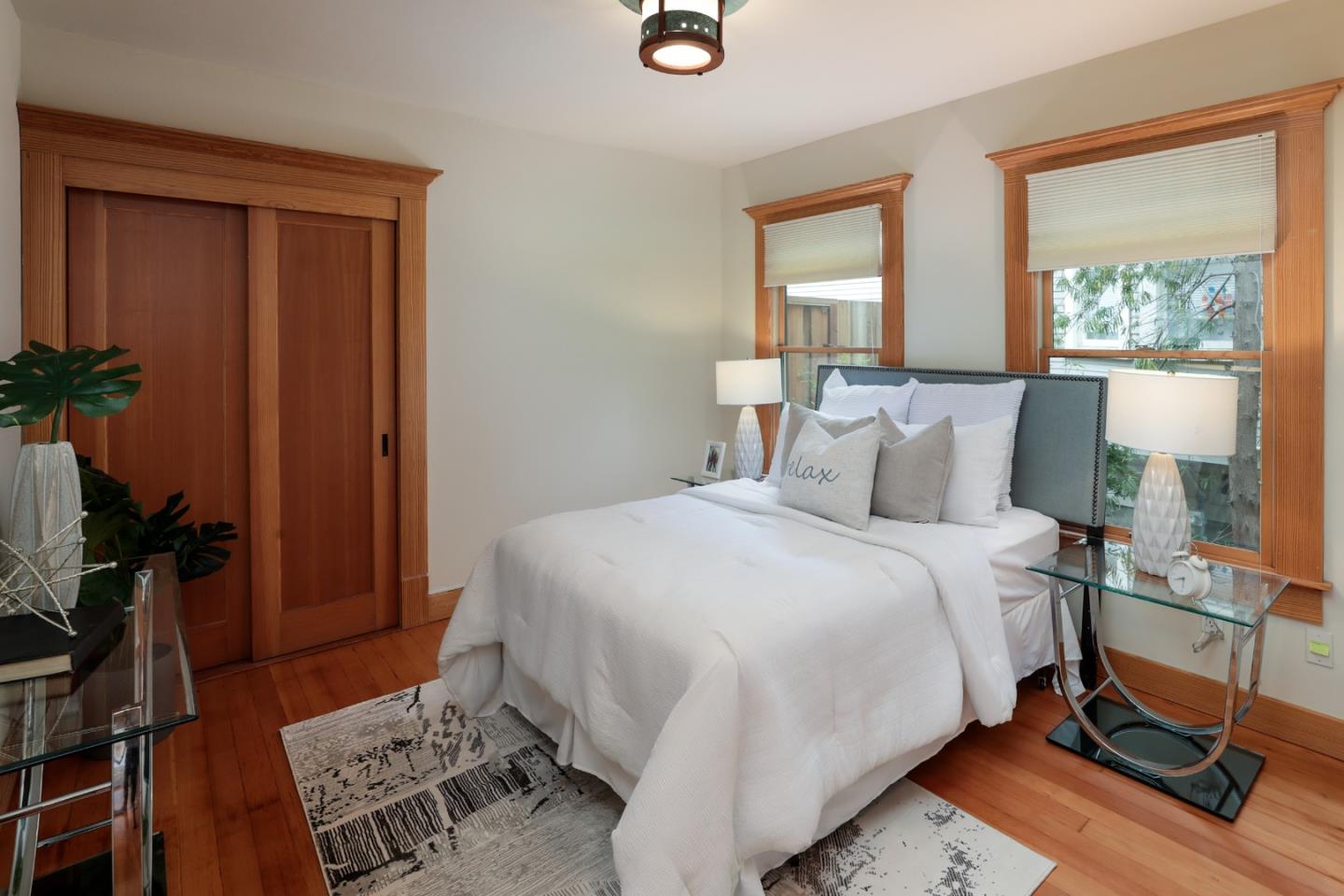 345 Berkeley Way Santa Cruz, CA 95062 - Photo 14 of 39 a bedroom with a bed and a window