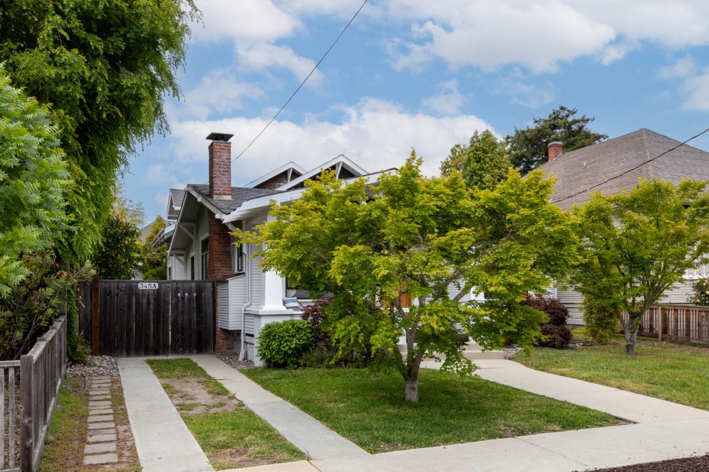 345 Berkeley Way Santa Cruz, CA 95062 - Photo 2 of 39 a view of backyard with swimming pool and green space