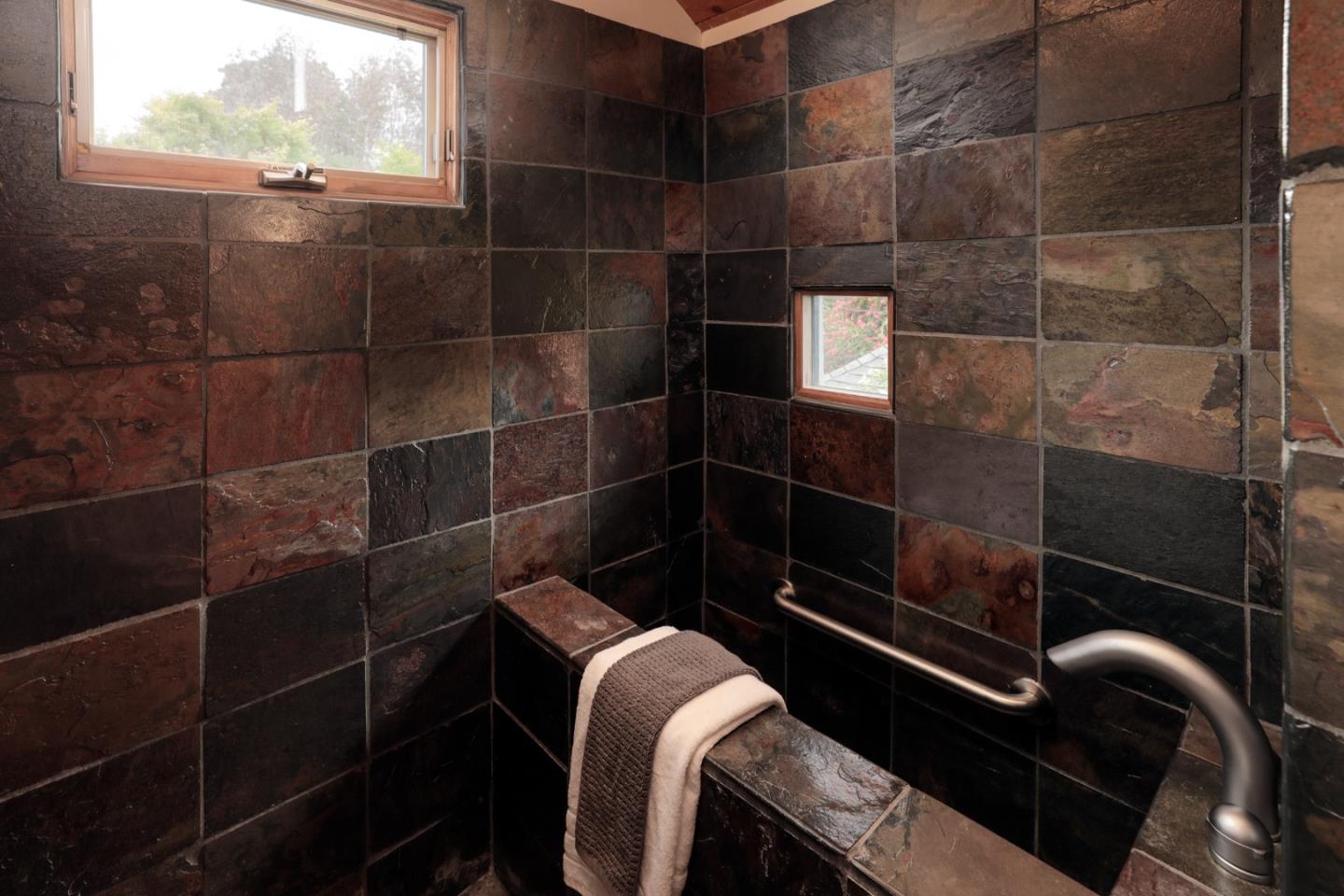 345 Berkeley Way Santa Cruz, CA 95062 - Photo 24 of 39 a bathroom with a sink a toilet and a shower