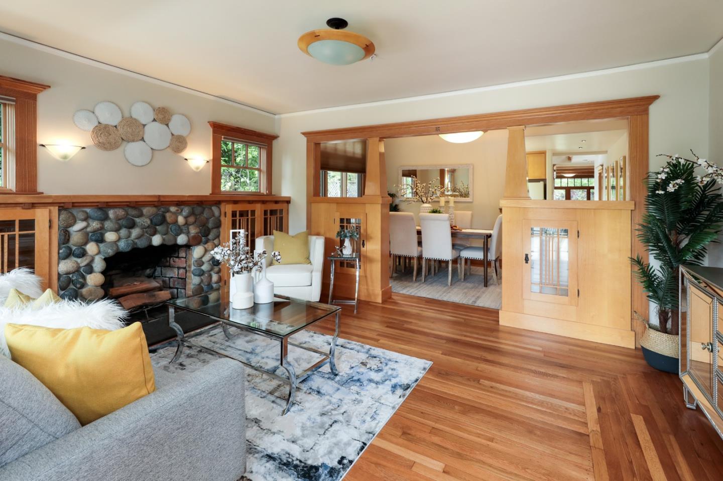 345 Berkeley Way Santa Cruz, CA 95062 - Photo 3 of 39 a living room with furniture and a fireplace