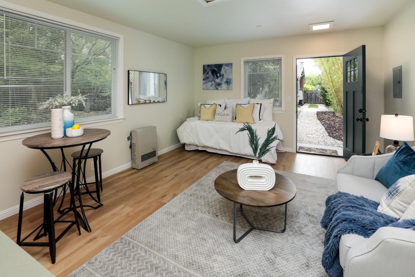 345 Berkeley Way Santa Cruz, CA 95062 - Photo 31 of 39 a living room with furniture and a large window