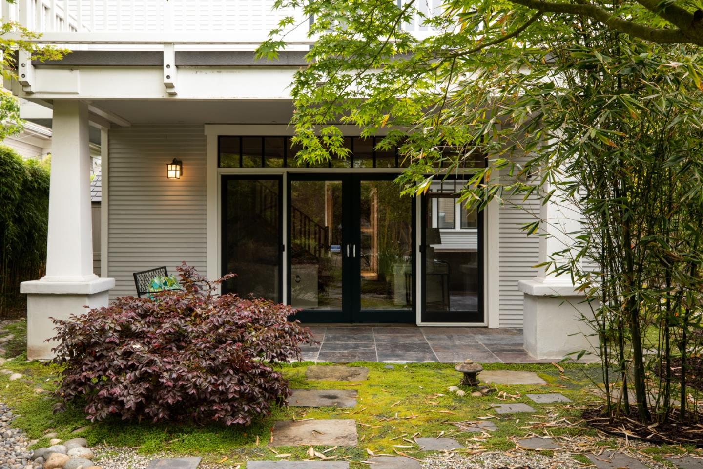 345 Berkeley Way Santa Cruz, CA 95062 - Photo 36 of 39 a view of a house with potted plants and large tree