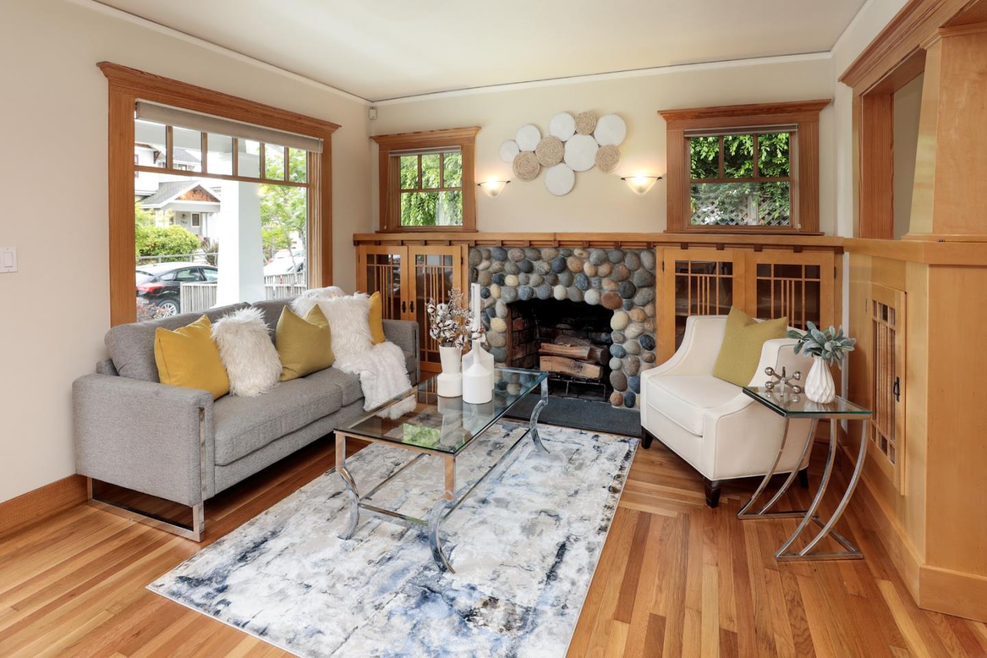 345 Berkeley Way Santa Cruz, CA 95062 - Photo 4 of 39 a living room with furniture and a fireplace