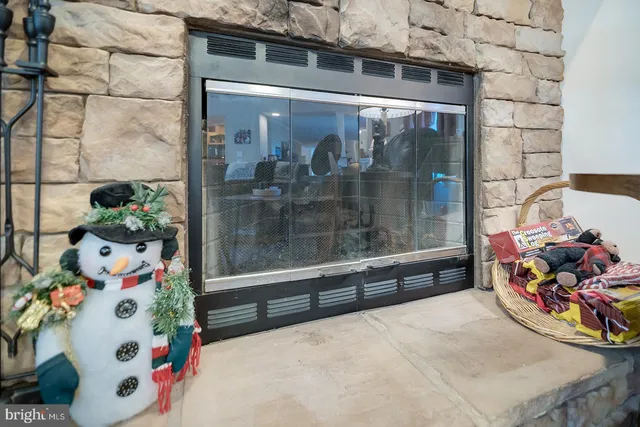 a workspace with furniture and cabinets